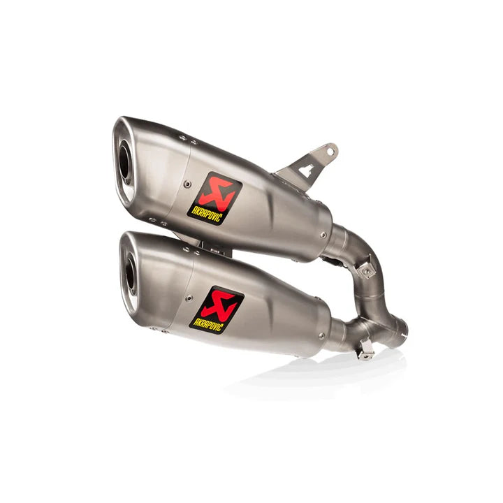 Akrapovic motorcycle exhaust mufflers displayed at Motorcycle Doctors workshop in Auckland