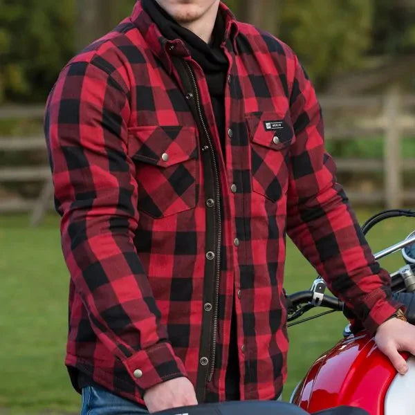Men’s motorcycle riding gear on display at Motorcycle Doctors workshop in Auckland