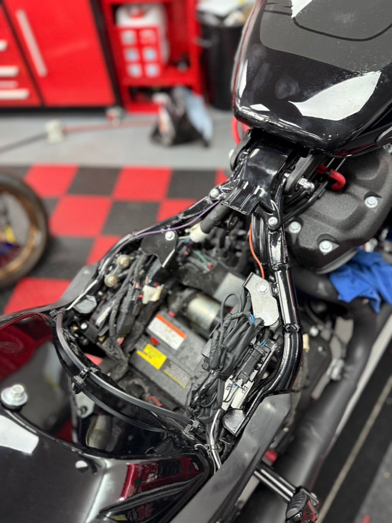 Motorcycle undergoing a full service at Motorcycle Doctors workshop in Auckland