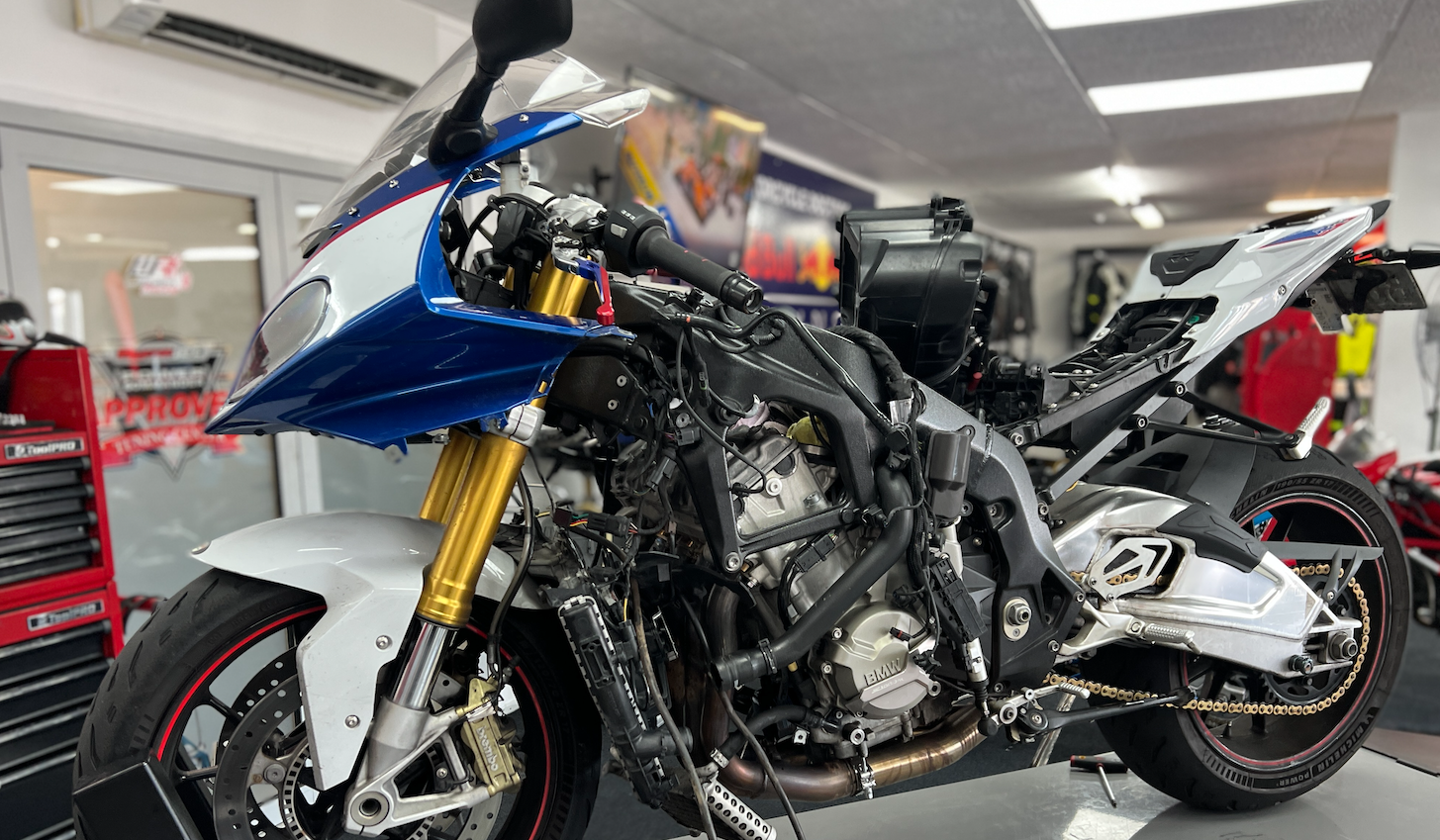 Insurance collision and crash repairs being performed on a motorcycle at Motorcycle Doctors in Auckland