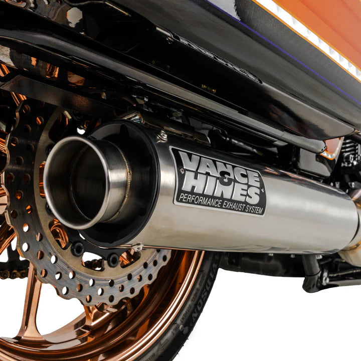 Vance & Hines motorcycle exhaust pipes displayed at Motorcycle Doctors workshop in Auckland