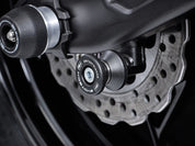 EP Paddock Stand Bobbins inserted into the offside swingarm of the Kawasaki Z650.